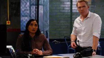 Polka dots brown blouse worn by Siya Malik (Anya Banerjee) as seen in The Blacklist (S10E07)