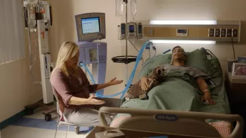 Sloth stuffed animal in the hands of Jason Monroe (Nick Arapoglou) in Florida Man TV show (S01E05)