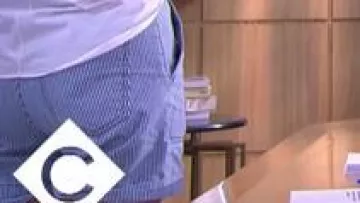 Anne-Élisabeth Lemoine's blue and white striped cargo shorts in the show C à Vous