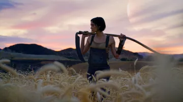 Denim overalls worn by Kora (Sofia Boutella) as seen in Rebel Moon