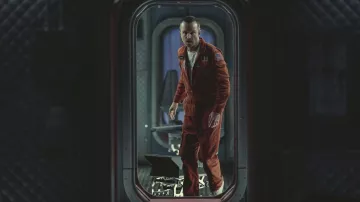 Orange Jumpsuit worn by Cliff Stanfield (Aaron Paul) in Black Mirror Outfits (S06E03)