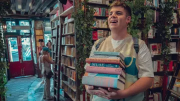 Printed sleeveless sweater worn by Isaac Henderson (Tobie Donovan) as seen in Heartstopper (Season 2)