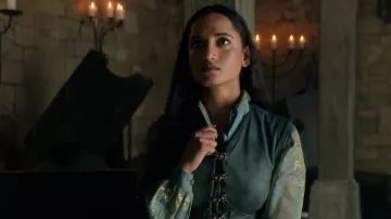 The embroidered green shirt worn by Inej Ghafa (Amita Suman) in Shadow and Bone: The Grisha Saga (S02E08)