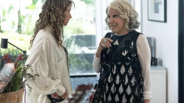 Black Sleeveless top worn by Corinne’s boss (Bette Midler) as seen in Sitting in Bars with Cake