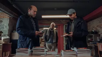 Navy blue coat jacket worn by Paul Matthews (Nicolas Cage) in Dream Scenario movie