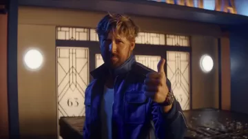 The blue jacket worn by Ryan (Ryan Gosling) in The Chase for Carrera