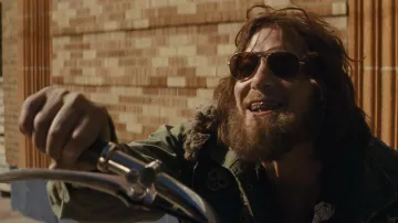 The Bikeriders Outfits: Norman Reedus is wearing Sunglasses to play Funny Sonny in the movie