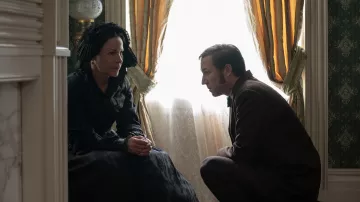 Black dress worn by Mary Todd Lincoln (Lili Taylor) as seen in Manhunt (S01E02)