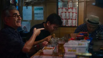 Blue short sleeve printed shirt worn by Eugene Levy in The Reluctant Traveler with Eugene Levy (S01E08)