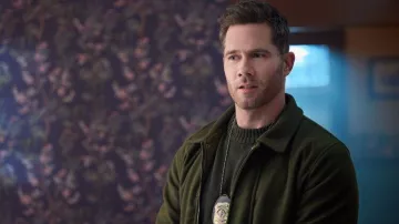Green zip jacket worn by Shawn (Luke Macfarlane) as seen in CrimeTime: Freefall