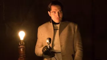 Beige jacket worn by Jack Delroy (David Dastmalchian) as seen in Late Night with the Devil movie outfits