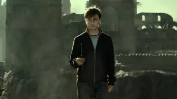 Black or Blue jacket with a collar and zip up worn by Harry Potter (Daniel Radcliffe) in Harry Potter and the Deathly Hallows: Part 2 movie outfits