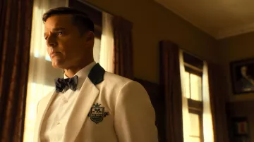 White and black Palm Royale Suit Uniform worn by Robert (Ricky Martin) as seen in Palm Royale TV series (S01E01)