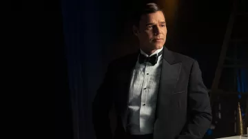 Black tuxedo suit worn by Robert (Ricky Martin) as seen in Palm Royale (S01E10)