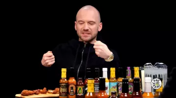 Rolex Gold Watch worn by Sean Evans as seen in Hot Ones on March 2024