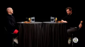 Nike sneakers worn by Sean Evans as seen in Hot Ones on March 2024