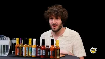 Knit Short Sleeve Polo Shirt worn by Lil Dicky as seen in Hot Ones on February 2024