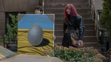 Brown leather handbag worn by Elizabeth (Tilda Swinton) as seen in Problemista