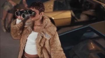 The binoculars used by Jorja Douglas in FLO's Walk Like This music video