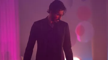 Black suit worn by The Kid (Dev Patel) as seen in Monkey Man movie outfits