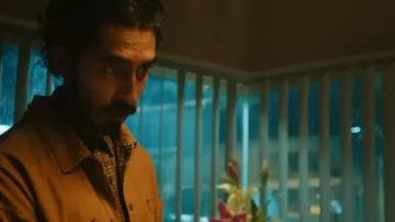 Brown plaid shirt worn by The Kid (Dev Patel) as seen in Monkey Man