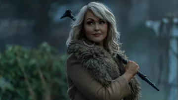 Fur collar coat worn by Esther (Jenn Lyon) as seen in Dead Boy Detectives (Season 1)