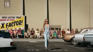 MaXXXine Outfits: Mia Goth is wearing Zip denim top to portray Maxine Minx in the movie