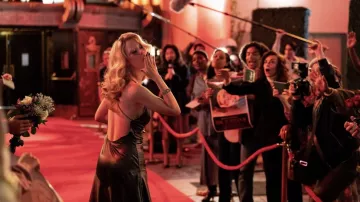 MaXXXine Movie Wardrobe: Maxine Minx (Mia Goth) is wearing a Silk Dress
