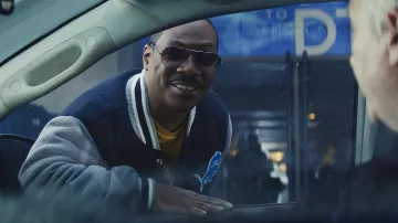 Beverly Hills Cop: Axel F Outfits: Eddie Murphy is wearing sunglasses to portray Axel Foley
