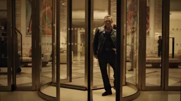 Daniel Craig Outfits: he is wearing Pleated Trousers in Belvedere Presents Daniel Craig, Directed by Taika Waititi Director’s Cut video