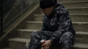 The dark blue military print jacket worn by Kanoe in his JOUR music video