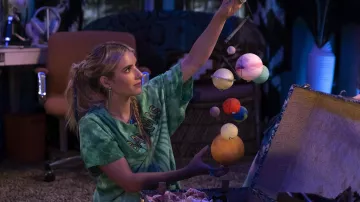 Clothing from Space Cadet: Emma Roberts is wearing Bahamas Tie and dye tee in green to portray Rex Simpson in the movie