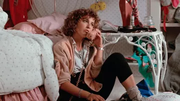 Ferris Bueller's Day Off Outfits: Jeanie Bueller (Jennifer Grey) is wearing Pink jacket in the movie