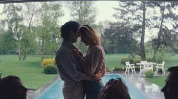 Looks from the movie L'amour Ouf: Adèle Exarchopoulos wears a striped shirt for her role as Jackie