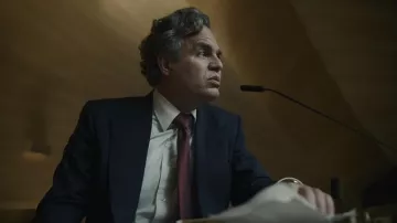 Outfits of Mickey 17 Movie: Mark Ruffalo is wearing Burgundy Tie to portray Hieronymous Marshall