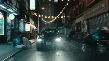 Wolfs Movie Vehicles: George Clooney is driving BMW Berline Car as Margaret's Man