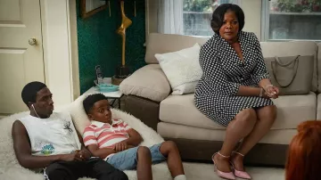 Outfits of The Deliverance Movie: Nate (Caleb McLaughlin) wears Printed tank top