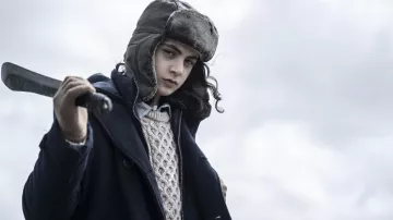 The Walking Dead: Daryl Dixon Outfits: Laurent Carrière (Louis Puech Scigliuzzi) wears Fur Chapka Hat in season 2