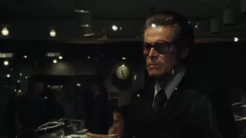 Saturday Night Movie Outfits: Willem Dafoe wears sunglasses to portray David Tebet