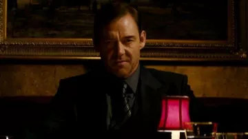 Outfits of The Equalizer Movie: Teddy (Marton Csokas) wears printed tie
