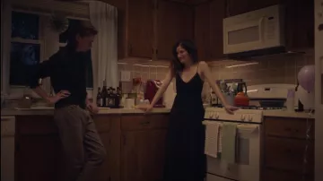 Outfits of Mrs. Fletcher: Eve Fletcher (Kathryn Hahn) wears Black spaghetti strap dress in season 1, episode 7