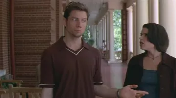 Collared Buttonless Maroon Short-Sleeved Shirt with White Trim of Randy Meeks (Jamie Kennedy) in Scream 2