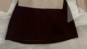 Black mini skirt of Nikki Freeman (Inde Navarrette) in Obsession