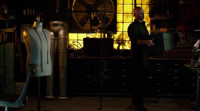 The costume of the man in stilts in the shop of Melvin Potter in Daredevil