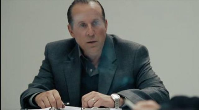The watch of Dr. Phillips (Peter Stormare) in The Killing Room