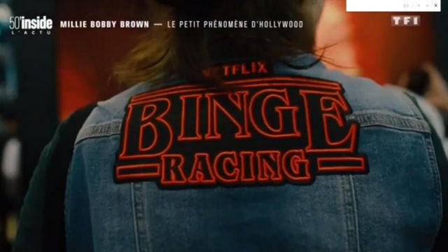 The crest patch interlining "Netflix Binge Racing" seen in 50 minutes Inside the 18/11/2017