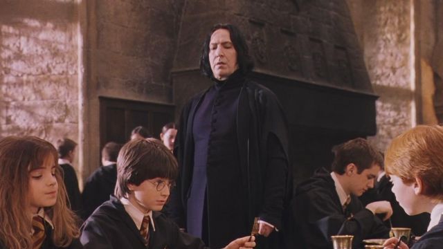 Holding Severus Rogue (Alan Rickman) in Harry Potter and the sorcerer's stone