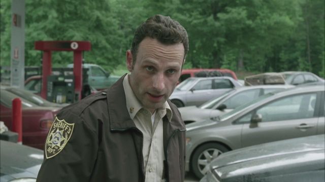 Le blouson de shériff de Rick Grimes (Andrew Lincoln) dans The Walking Dead S01E01
