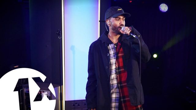 La chemise à carreaux 2 Tones bicolore de Big Sean dans la vidéo "Big Sean - Moves in the 1Xtra Live Lounge"