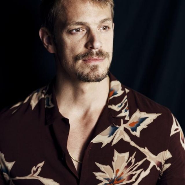 Floral print shirt worn by Joel Kinnaman photographed for WWD by Weston ...